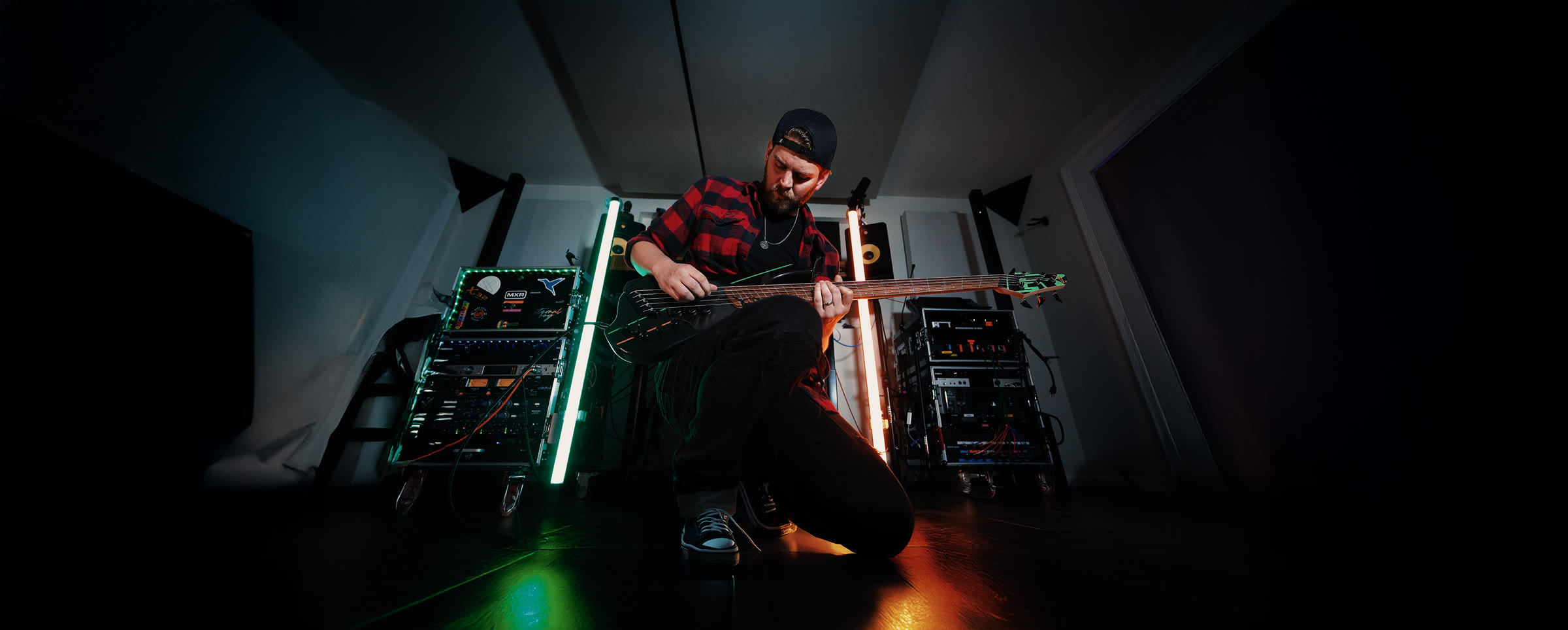 Matt Winwood playing bass in his Pittsburgh studio
